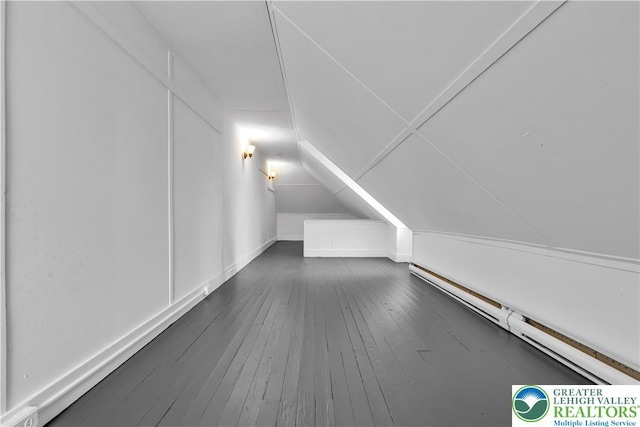 834 Bushkill St, Easton, PA 18042 - additional living space featuring dark wood-style flooring, a baseboard heating unit, and lofted ceiling