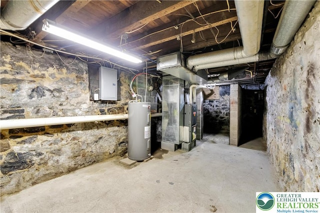 834 Bushkill St, Easton, PA 18042 - unfinished basement featuring electric water heater, electric panel, and heating unit