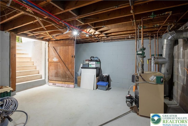 7035 Scenic Dr, Bloomsburg, PA 17815 - unfinished basement featuring stairway and a heating unit