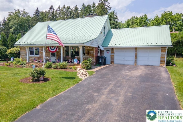 7035 Scenic Dr, Bloomsburg, PA 17815 - view of front of house with stone siding, a front lawn, an attached garage, and a porch