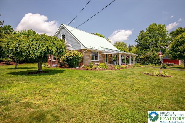 7035 Scenic Dr, Bloomsburg, PA 17815 - view of grassy yard with a porch