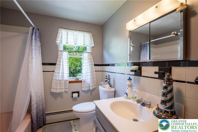 7035 Scenic Dr, Bloomsburg, PA 17815 - full bath featuring a baseboard radiator, vanity, shower / bath combo with shower curtain, tile walls, and wainscoting
