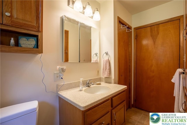 7035 Scenic Dr, Bloomsburg, PA 17815 - bathroom with vanity and toilet
