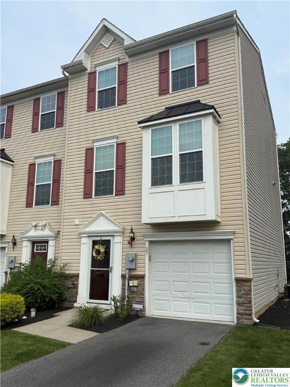 23 Yellow Rose Ln, Easton, PA 18045 - multi unit property featuring a garage, stone siding, and driveway