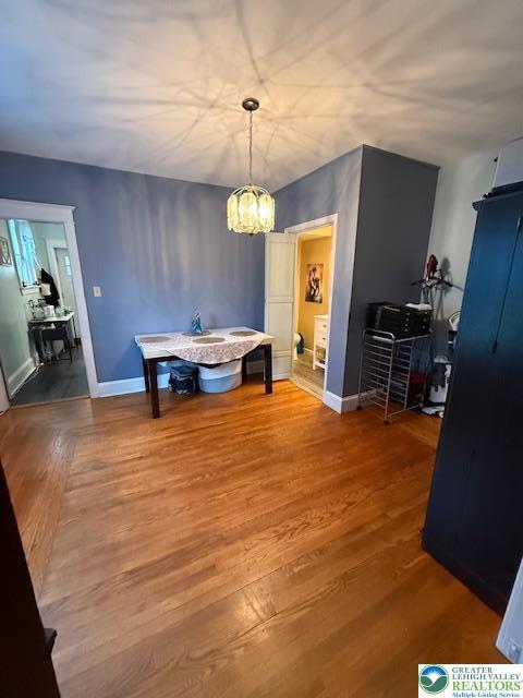 2413 Walbert, South Whitehall Twp, PA 18104 - dining space featuring wood finished floors and a chandelier