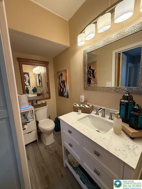 2413 Walbert, South Whitehall Twp, PA 18104 - bathroom featuring wood finished floors and vanity