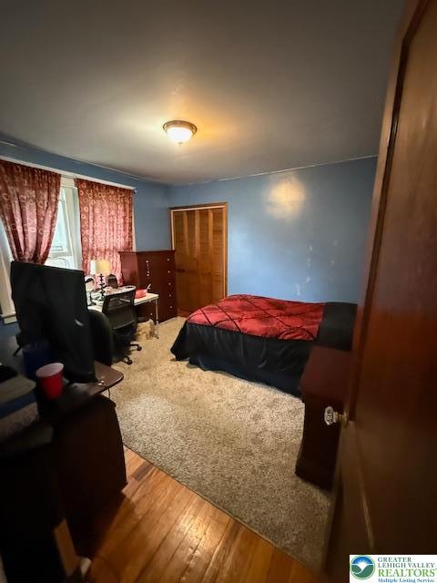 2413 Walbert, South Whitehall Twp, PA 18104 - bedroom with wood finished floors, an office area, and a closet