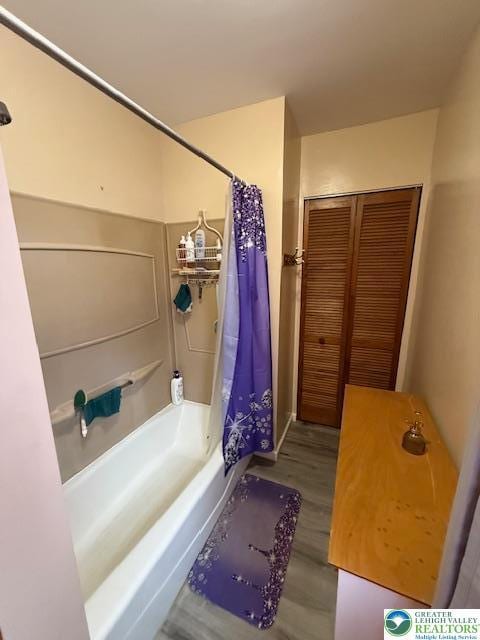 2413 Walbert, South Whitehall Twp, PA 18104 - full bathroom featuring wood finished floors and shower / bath combination with curtain