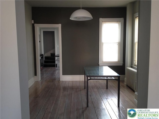 1002 Lehigh St, Easton, PA 18042 - dining room featuring radiator heating unit and hardwood / wood-style flooring