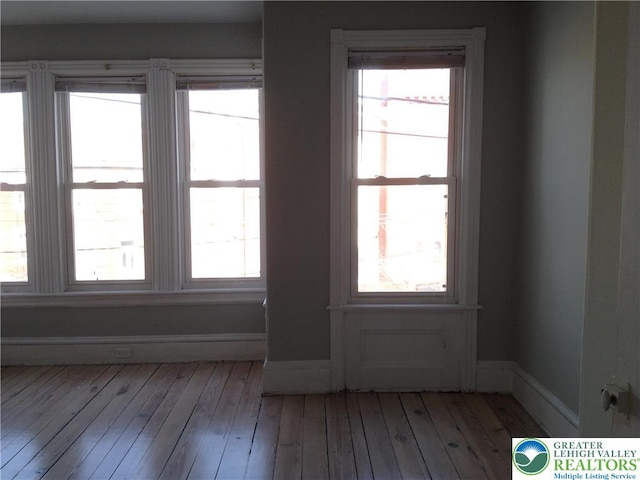 1002 Lehigh St, Easton, PA 18042 - empty room with plenty of natural light and hardwood / wood-style floors