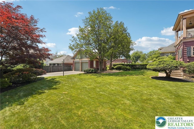 200 W Pierce St, Easton, PA 18042 - view of yard featuring driveway and an attached garage