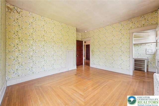 200 W Pierce St, Easton, PA 18042 - unfurnished room featuring wallpapered walls and parquet floors