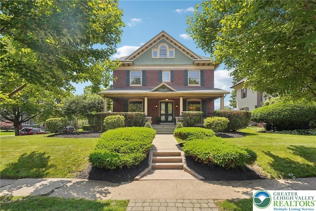 200 W Pierce St, Easton, PA 18042 - traditional style home with a front lawn, a porch, and french doors