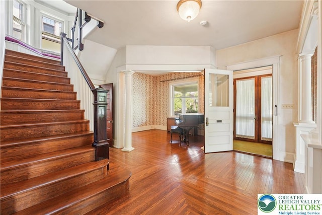 200 W Pierce St, Easton, PA 18042 - foyer entrance with decorative columns, stairway, and french doors
