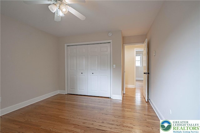 1450 Coventry Rd, South Whitehall Twp, PA 18104 - unfurnished bedroom featuring light wood-style floors, a closet, and a ceiling fan