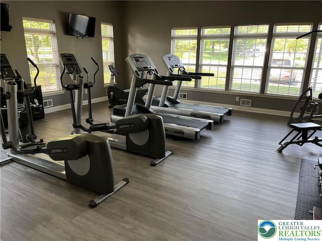 607 Prestwick Dr, Williams Twp, PA 18042 - exercise room featuring wood finished floors and baseboards