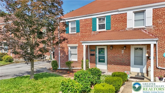 1509 Liberator Ave, Allentown City, PA 18103 - townhome / multi-family property featuring brick siding and roof with shingles