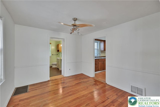 1509 Liberator Ave, Allentown City, PA 18103 - spare room with light wood-style floors and a ceiling fan