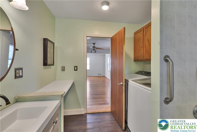 1509 Liberator Ave, Allentown City, PA 18103 - laundry area featuring cabinet space, dark wood-style flooring, ceiling fan, and washer and dryer