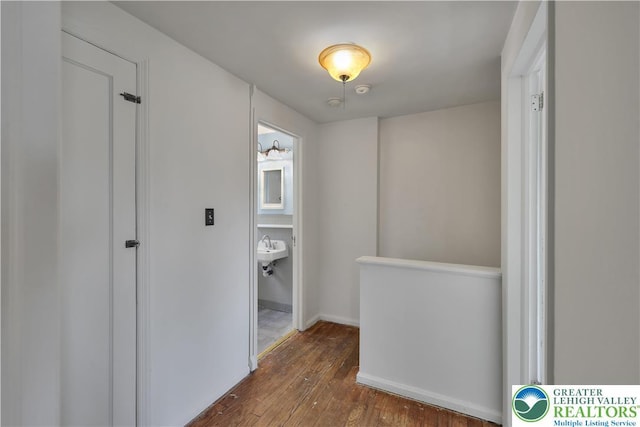 1509 Liberator Ave, Allentown City, PA 18103 - hall featuring dark wood-type flooring and an upstairs landing