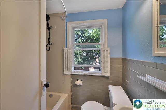 1509 Liberator Ave, Allentown City, PA 18103 - full bathroom with healthy amount of natural light and tile walls