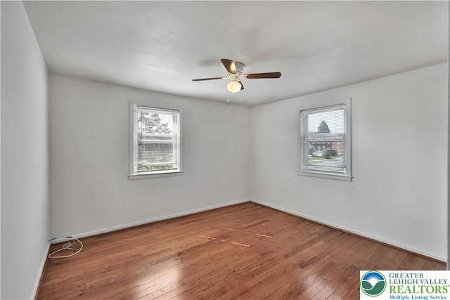 1509 Liberator Ave, Allentown City, PA 18103 - spare room with healthy amount of natural light, hardwood / wood-style flooring, and a ceiling fan