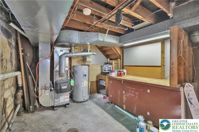 1509 Liberator Ave, Allentown City, PA 18103 - unfinished basement featuring electric water heater, concrete block wall, and heating unit