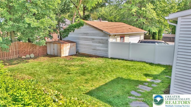 1509 Liberator Ave, Allentown City, PA 18103 - view of yard featuring a storage unit and a garage