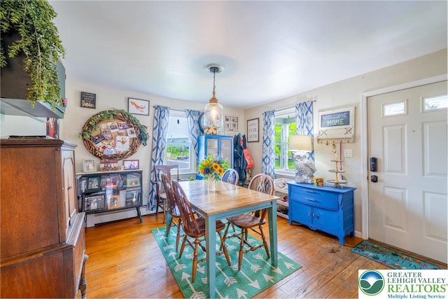 103 A St, Wind Gap Boro, PA 18091 - dining room with light wood-style floors and a baseboard heating unit