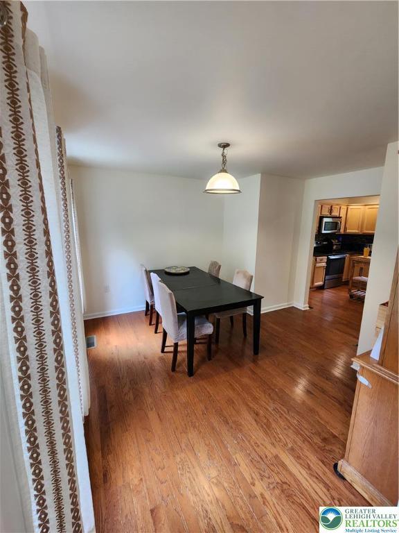 7 Twelve Oaks Trl, Chestnuthill Twp, PA 18353 - dining room with dark wood-type flooring