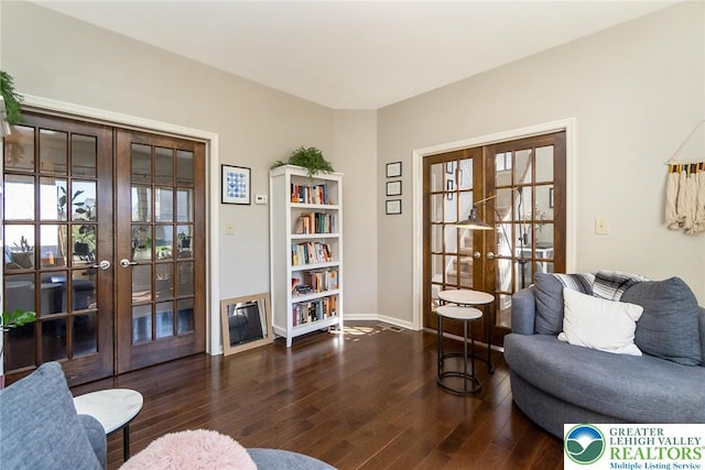 21 Millbrook Ct, Palmer Twp, PA 18045 - sitting room with french doors and wood finished floors