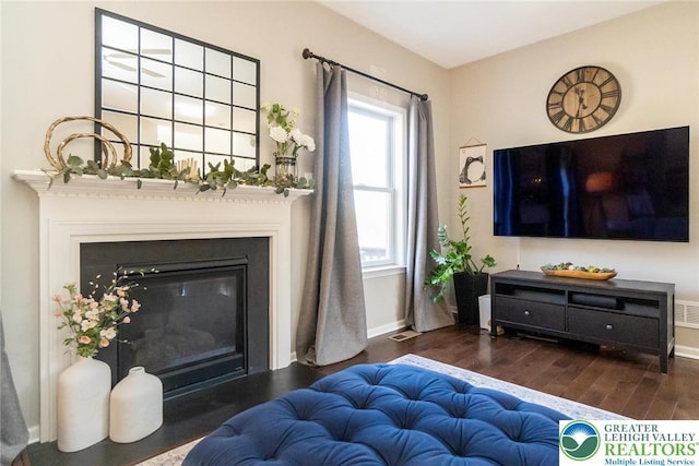 21 Millbrook Ct, Palmer Twp, PA 18045 - living area featuring wood finished floors and a glass covered fireplace