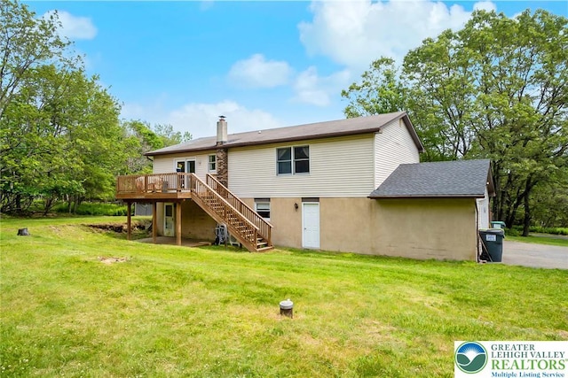2227 Cheyenne Dr, Tunkhannock Township, PA 18610 - rear view of house featuring stairs, a wooden deck, a yard, and a chimney