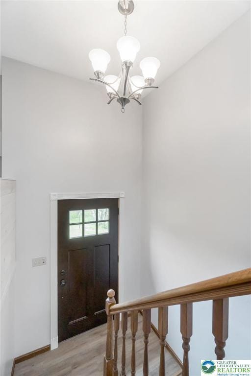 2227 Cheyenne Dr, Tunkhannock Township, PA 18610 - foyer entrance featuring a chandelier and light wood-type flooring