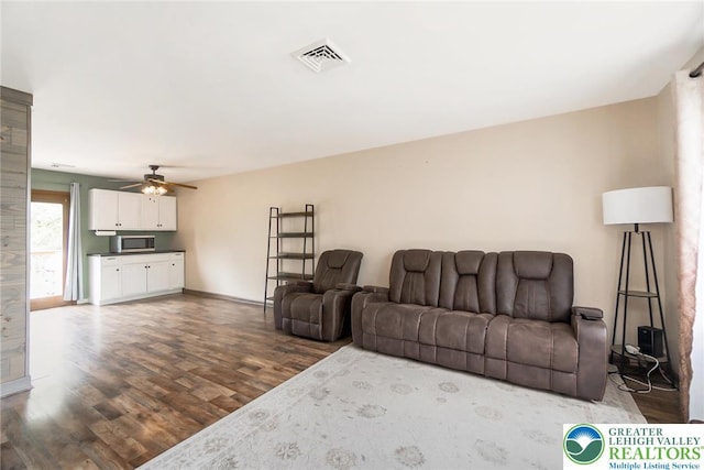 2227 Cheyenne Dr, Tunkhannock Township, PA 18610 - living area with wood finished floors and a ceiling fan