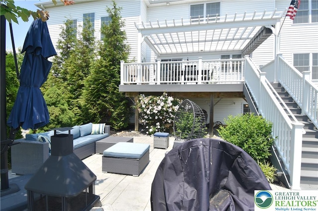 4323 Saratoga Dr, Lower Nazareth Twp, PA 18020 - view of patio with an outdoor living space, a grill, stairs, a wooden deck, and a pergola