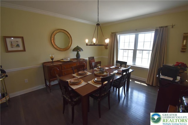 4323 Saratoga Dr, Lower Nazareth Twp, PA 18020 - dining room with dark wood-style floors, crown molding, and a chandelier