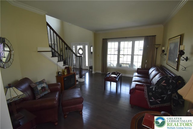4323 Saratoga Dr, Lower Nazareth Twp, PA 18020 - living area featuring wood finished floors, stairway, and crown molding