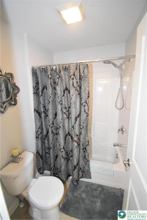 4323 Saratoga Dr, Lower Nazareth Twp, PA 18020 - full bathroom featuring shower / bath combo with shower curtain and toilet