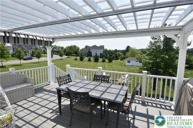 4323 Saratoga Dr, Lower Nazareth Twp, PA 18020 - wooden terrace featuring outdoor dining space, a lawn, a pergola, and an outdoor structure