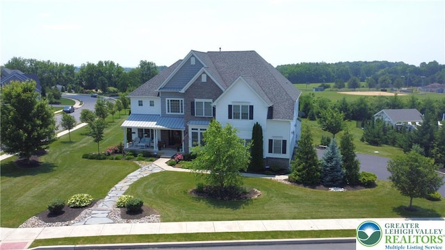 4323 Saratoga Dr, Lower Nazareth Twp, PA 18020 - craftsman-style house with a porch and a front lawn