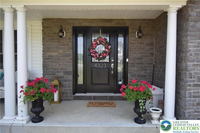 4323 Saratoga Dr, Lower Nazareth Twp, PA 18020 - doorway to property with a porch and brick siding