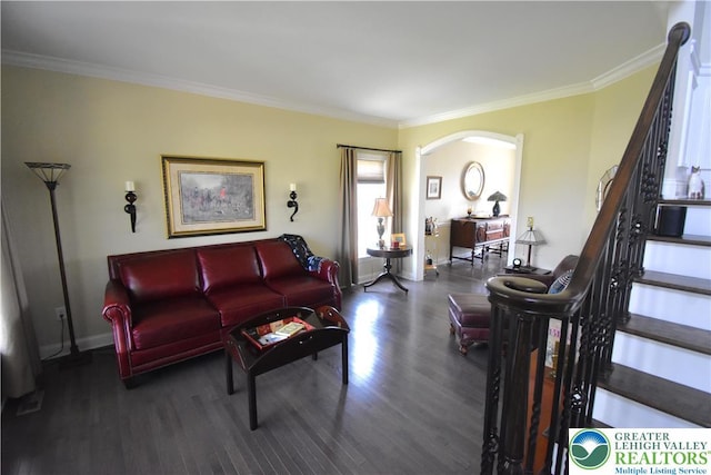 4323 Saratoga Dr, Lower Nazareth Twp, PA 18020 - living room featuring wood finished floors, stairway, arched walkways, and ornamental molding