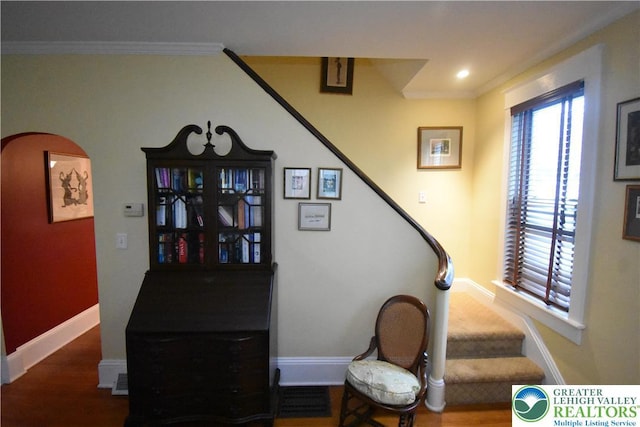 407 W Burke St, Easton, PA 18042 - stairs with ornamental molding, arched walkways, wood finished floors, and recessed lighting