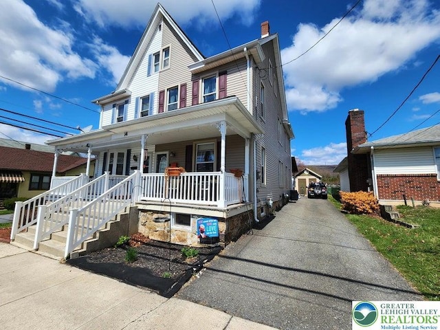14 W 10th St, Jim Thorpe Borough, PA 18229 - view of front of home featuring covered porch and driveway