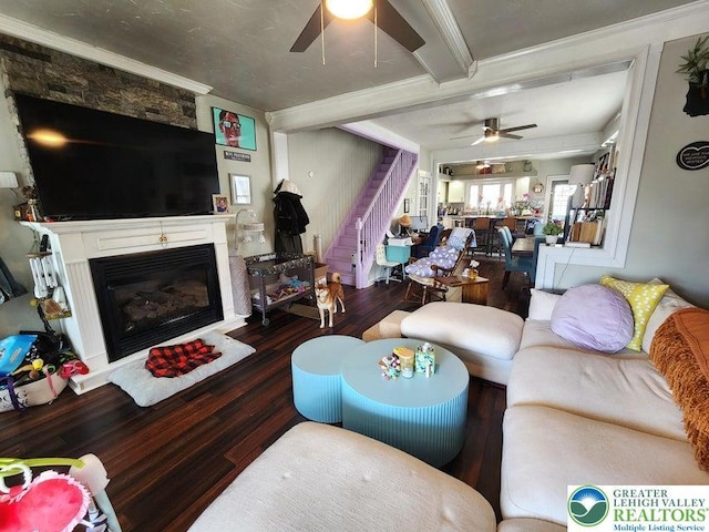 14 W 10th St, Jim Thorpe Borough, PA 18229 - living room with a ceiling fan, stairway, wood finished floors, crown molding, and a glass covered fireplace