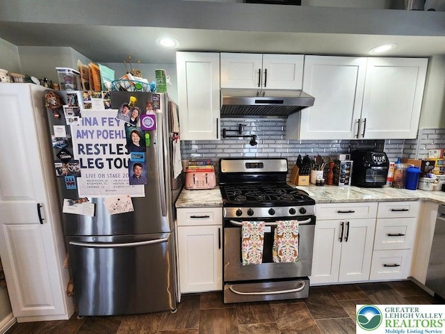 14 W 10th St, Jim Thorpe Borough, PA 18229 - kitchen with stainless steel appliances, under cabinet range hood, and white cabinetry