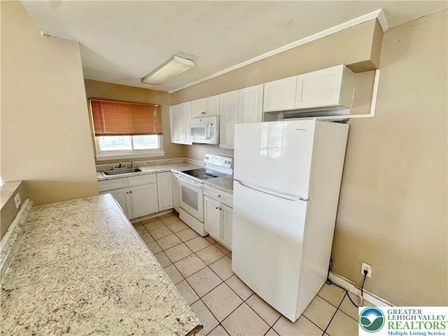 909 Genesee St, Allentown City, PA 18103 - kitchen with white appliances, white cabinetry, light countertops, and light tile patterned floors