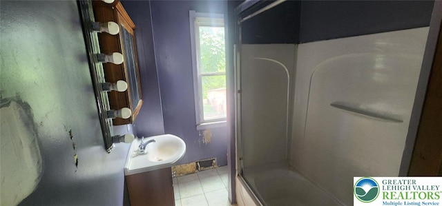 2463 Hillside Ave, Wilson Boro, PA 18042 - full bathroom featuring plenty of natural light, tile patterned floors, vanity, and washtub / shower combination