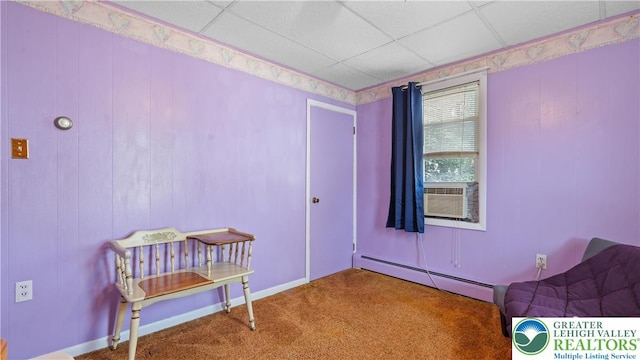 107 B St, Pen Argyl Boro, PA 18072 - living area featuring a baseboard radiator, carpet floors, cooling unit, and a paneled ceiling